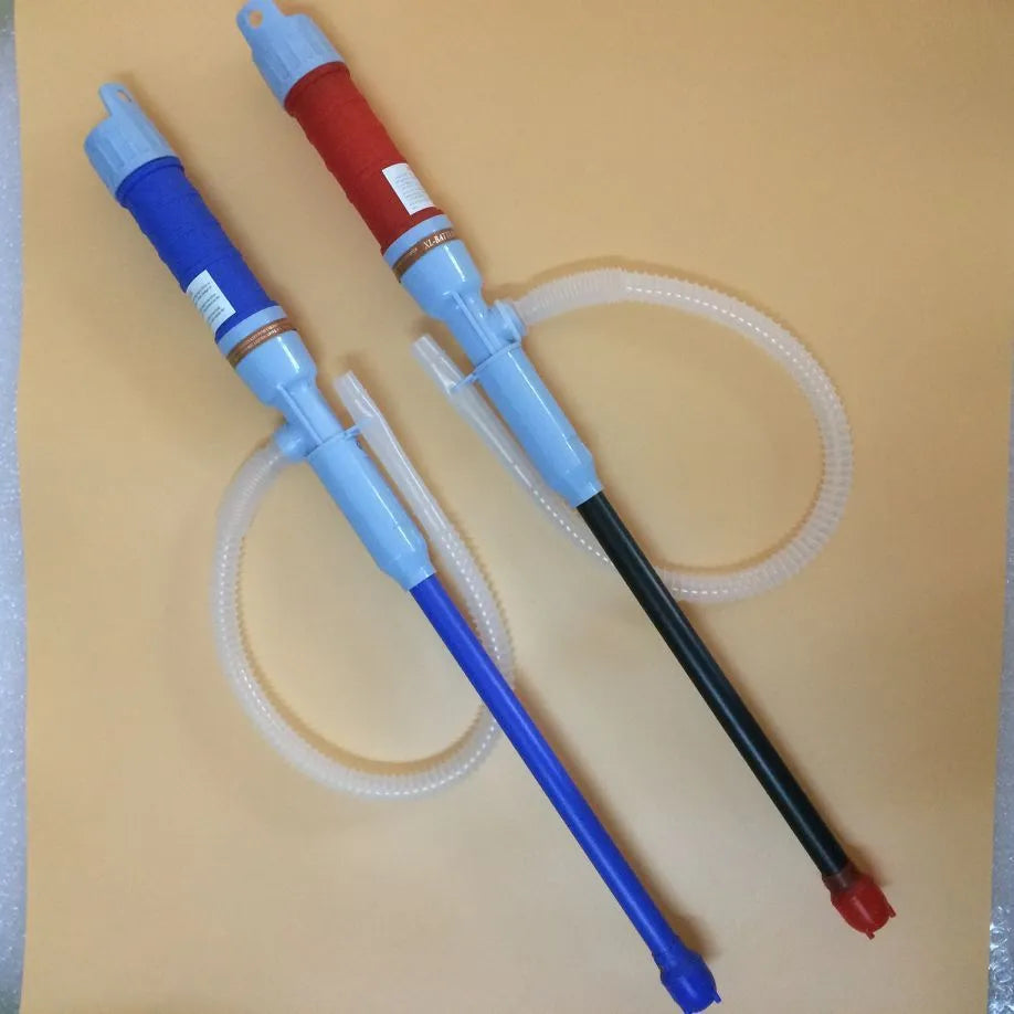 Blue and red manual hand pump for siphoning fuel and oil from containers