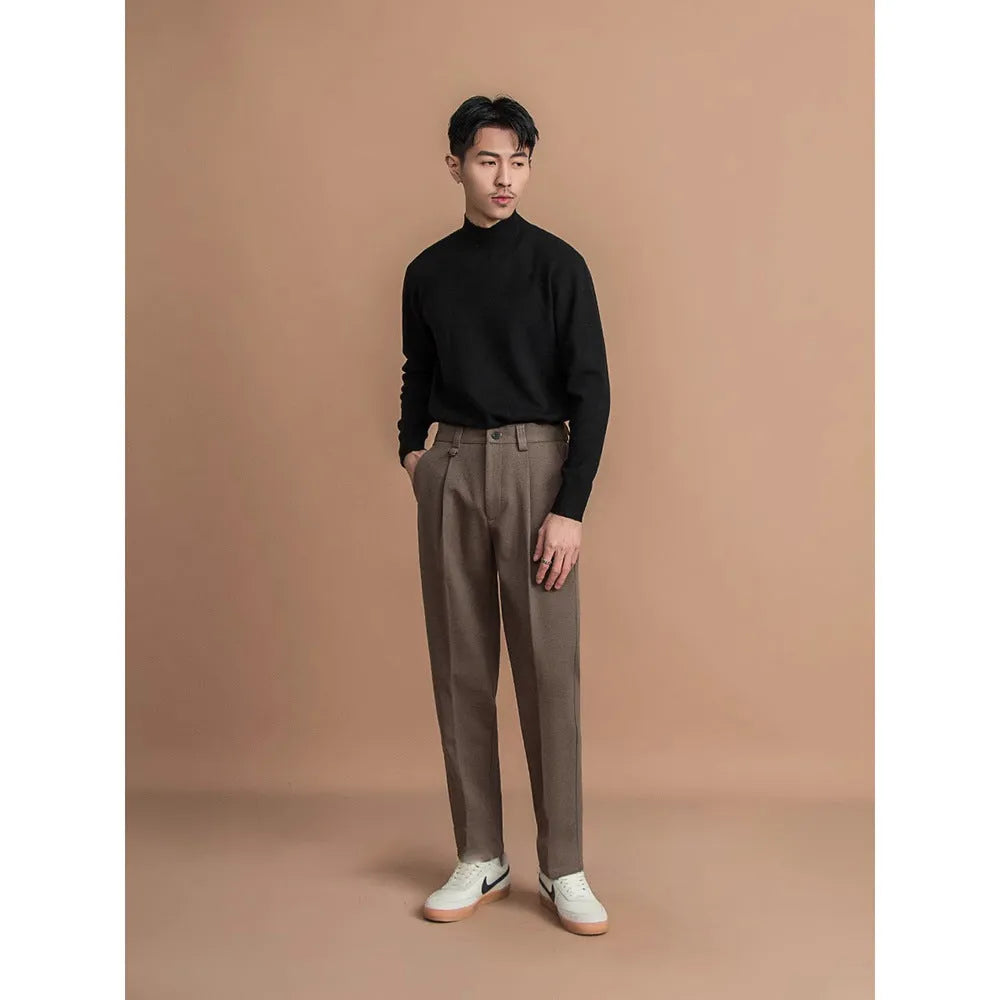 Men's straight leg casual business trousers in black, shown in a light business style setting.