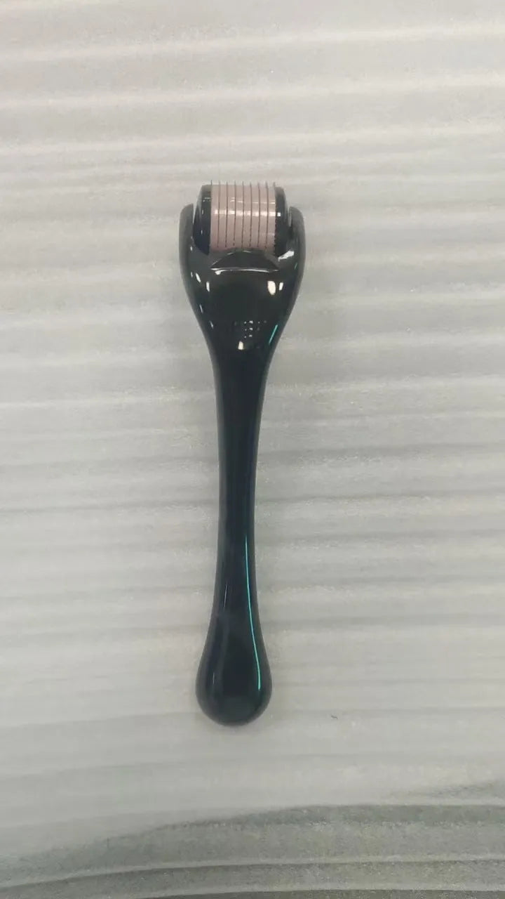 540 micro needle derma roller showing handle and needle wheel in a selected colour