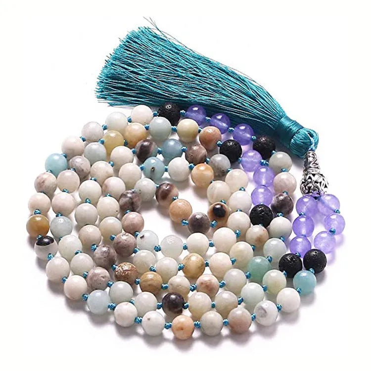 Long multicoloured agate and gemstone tassel necklace with geometric beads.