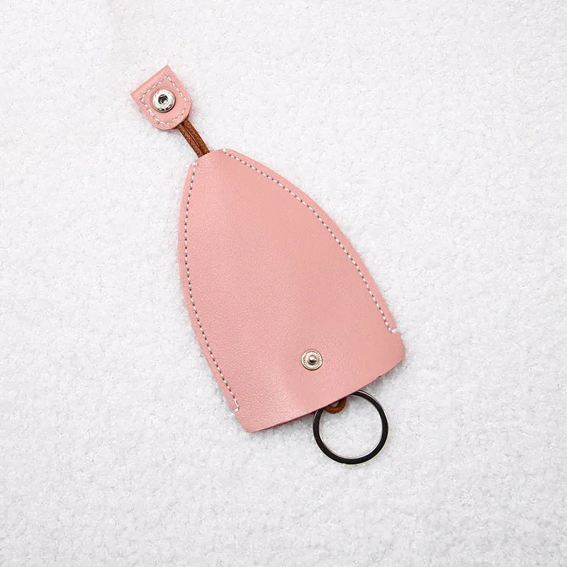 Cartoon pull-out key case in PU leather with colourful design, showing compact 14cm by 7.5cm dimensions