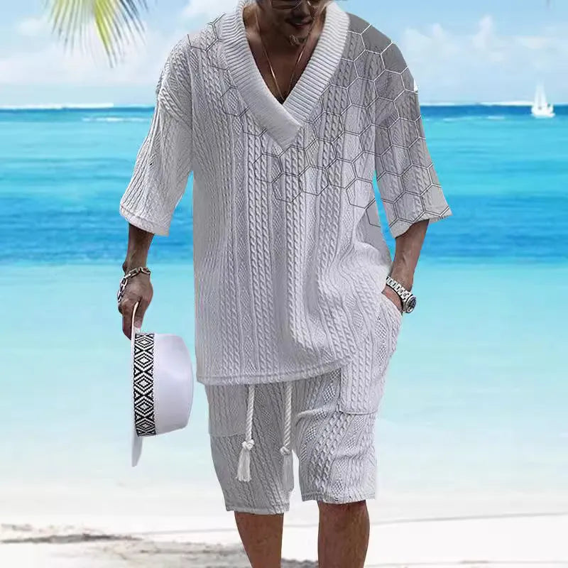 Men's knitted short-sleeved top and matching shorts in a solid colour, showing relaxed drop-shoulder fit.