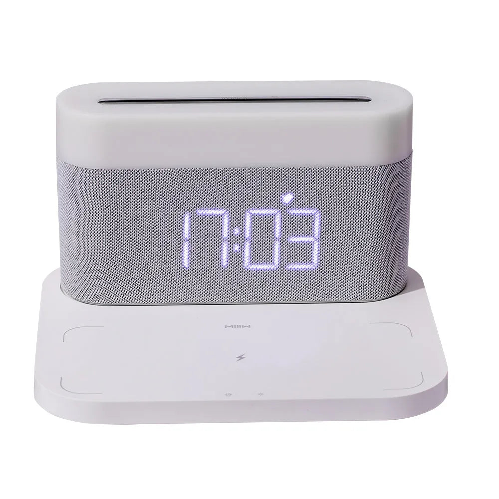 Wireless desktop charger with clock display and night light in modern ABS design