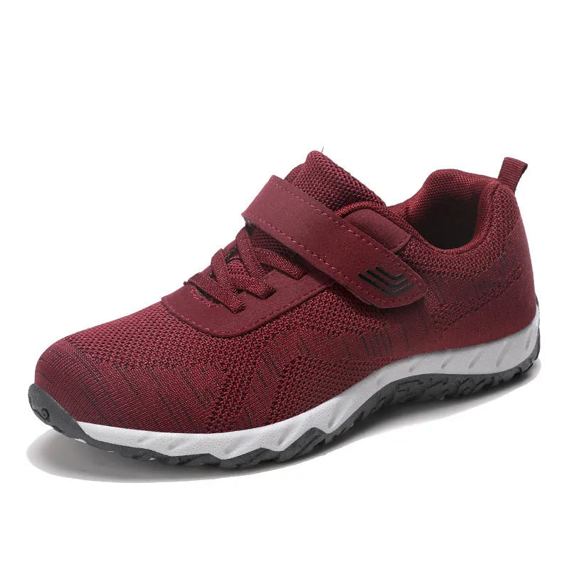 Women's low-top grey purple wedge heel shoes with velcro strap and breathable mesh upper.
