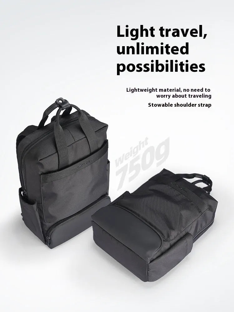 Elegant black Oxford cloth computer backpack with 20-35 litre capacity and a laptop compartment.