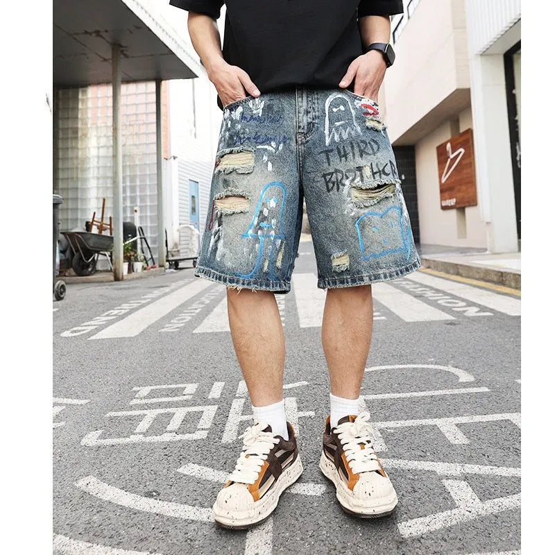 Men's blue distressed denim shorts with straight leg cut and zipper fly