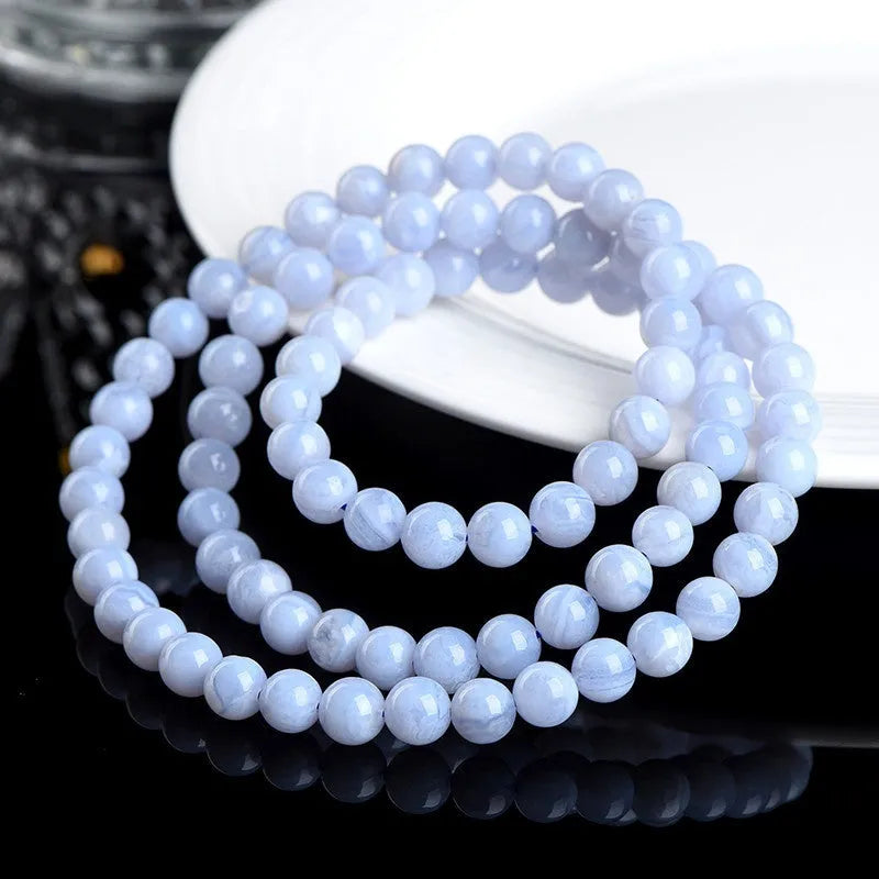 Natural blue agate bracelet with multi-circle patterns and striped crystal beads in original Ruyi design