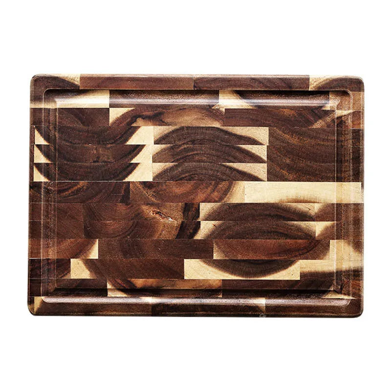 Brown acacia wood parquet cutting board with 3cm thickness on kitchen counter