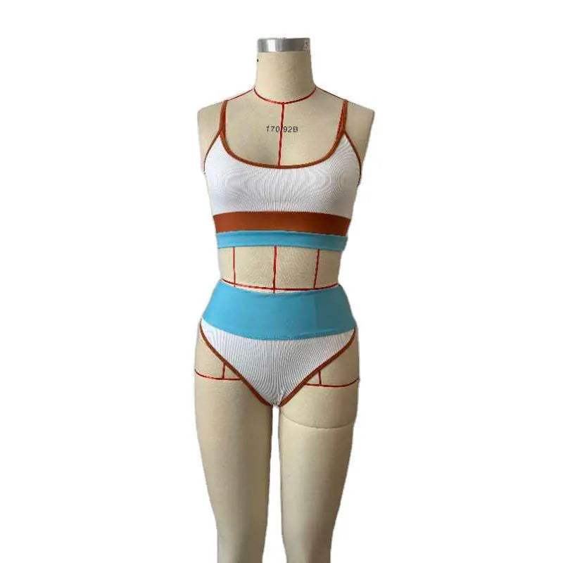 Women's solid colour quick-drying swimwear set consisting of a top and shorts.