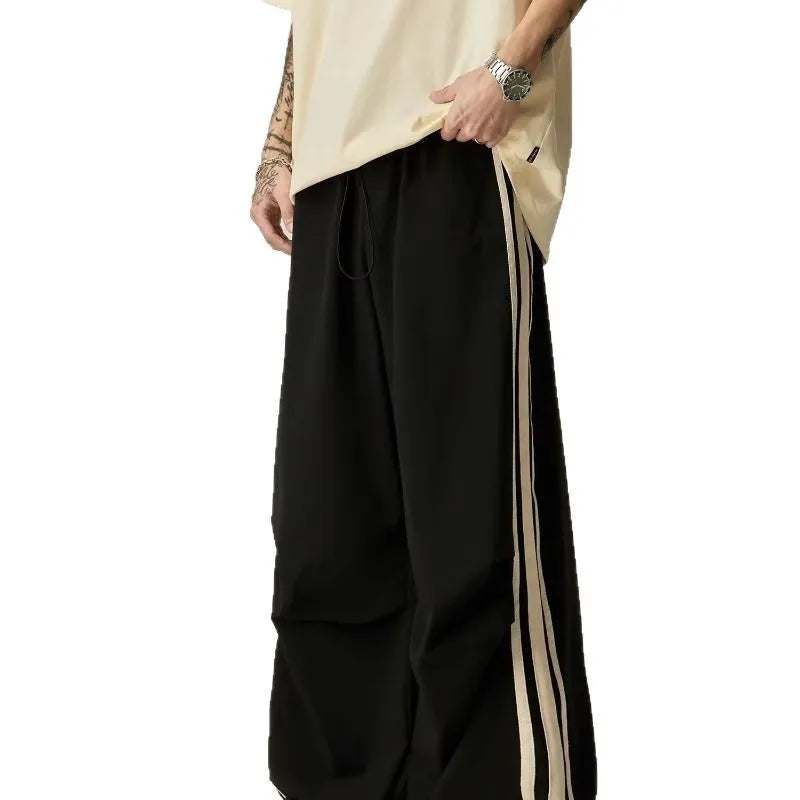 Men's black wide leg climbing trousers with high waist and straight leg design