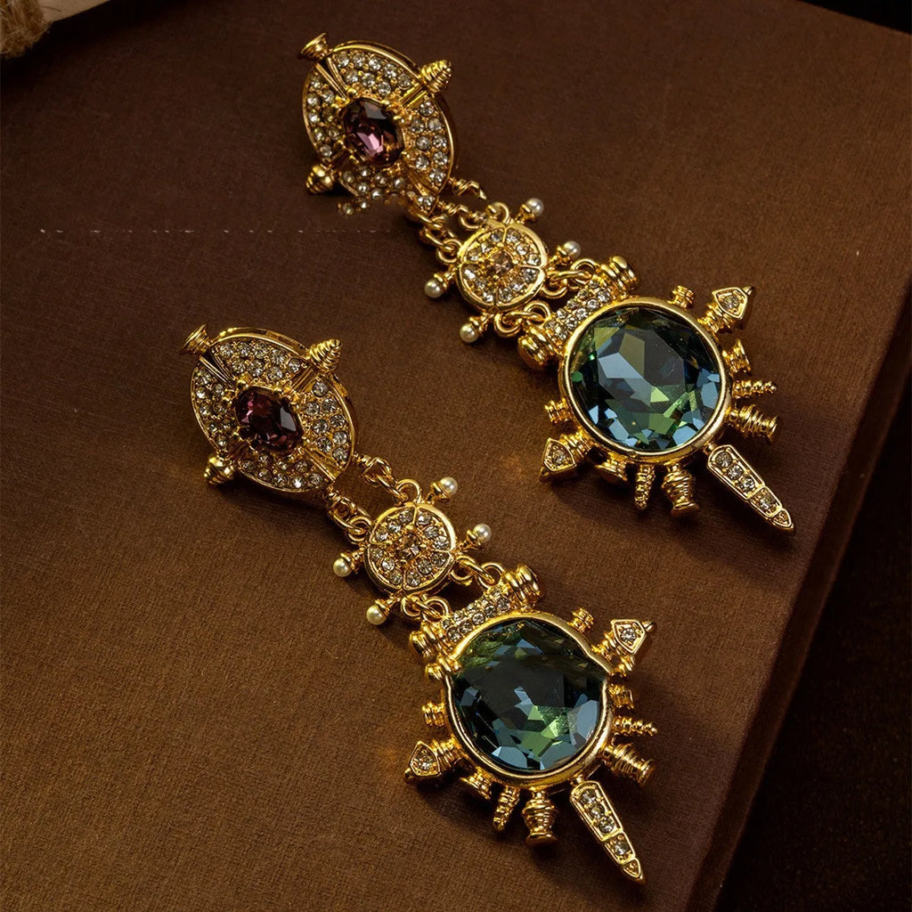 Gold colour retro geometric stud earrings with round design elements on alloy material