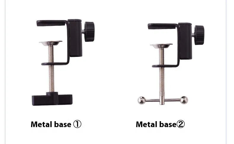 Black foldable metal cantilever bracket holding a tablet on a desktop, showing adjustable arms and clamp.