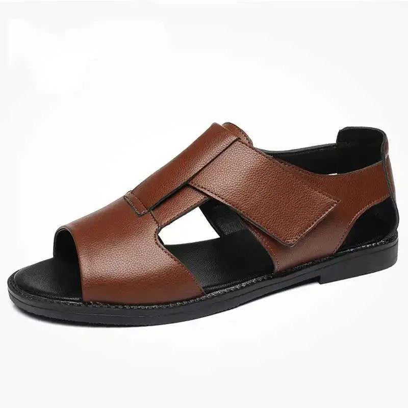 Men's black and brown Roman-style open-toe sandals with a leather upper and rubber sole.