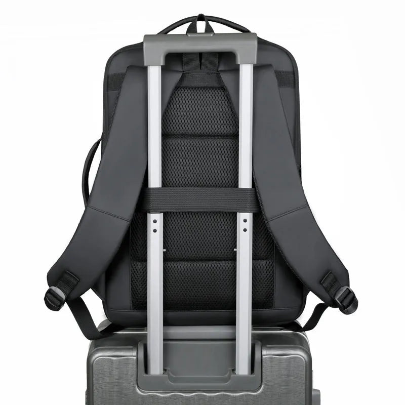 Black business backpack with curved shoulder straps showing waterproof Oxford cloth construction