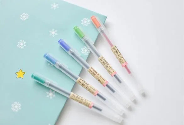 12 Muji gel pens with 0.5mm nibs showing ink prevention mechanism