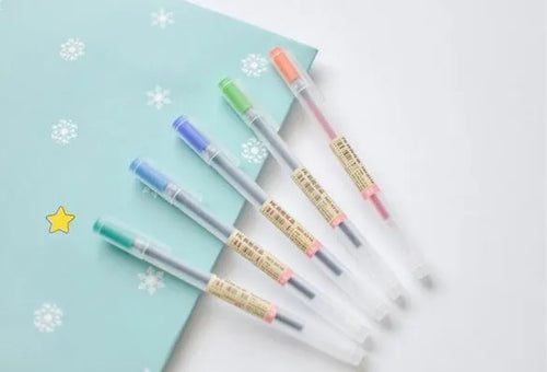 12 Muji gel pens with 0.5mm nibs showing ink prevention mechanism
