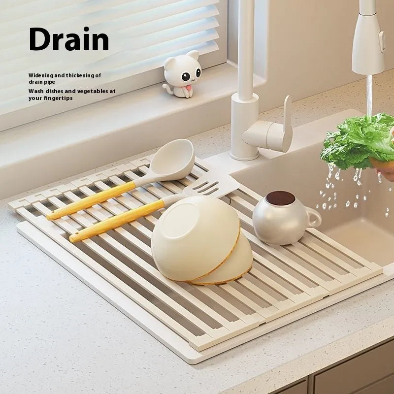 Foldable milky white stainless steel kitchen draining rack inside a sink