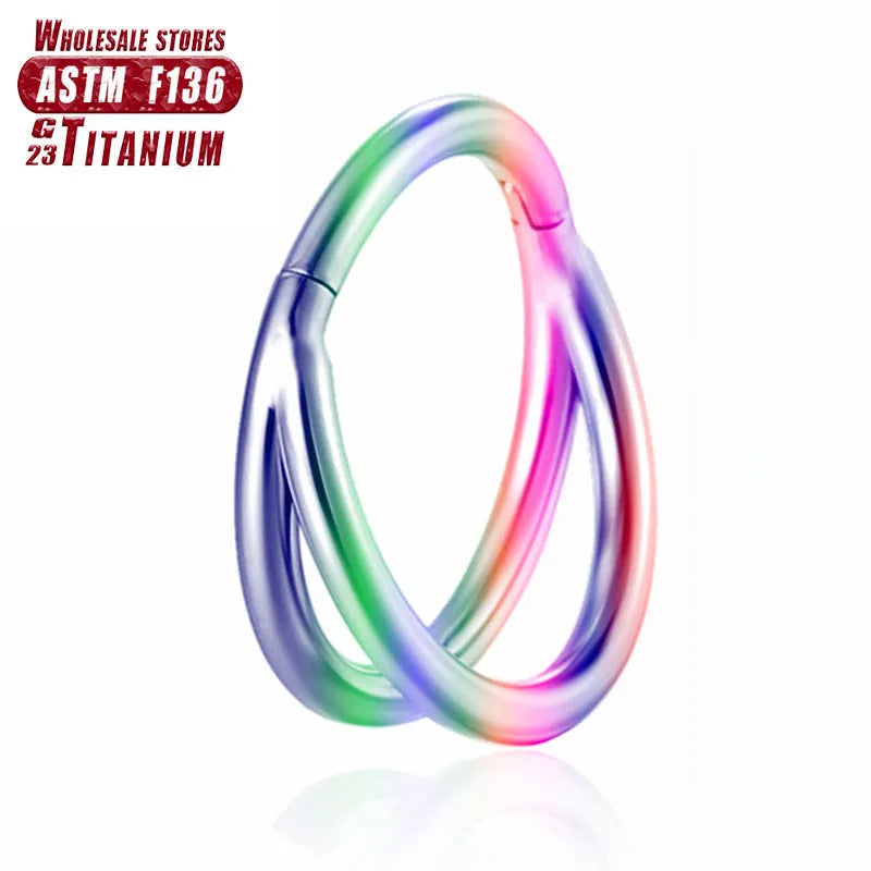 Titanium alloy fork nose ring for body piercing in silver colour on a grey background.