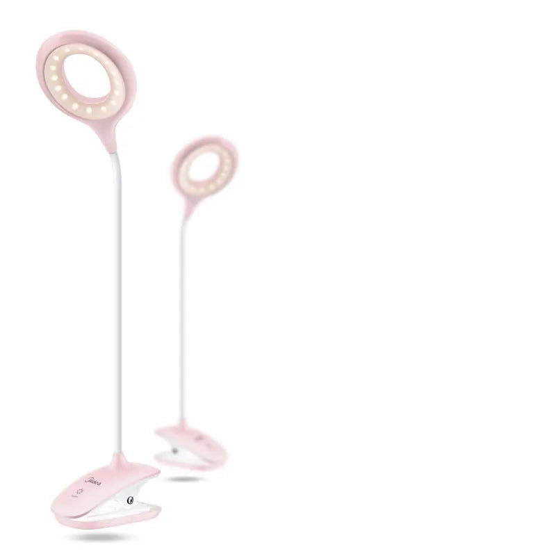 Green, pink, and white USB rechargeable table lamp with a touch switch on a wooden desk.