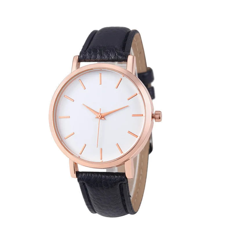 Square-faced quartz watch with an alloy case and PU leather strap on a wrist.