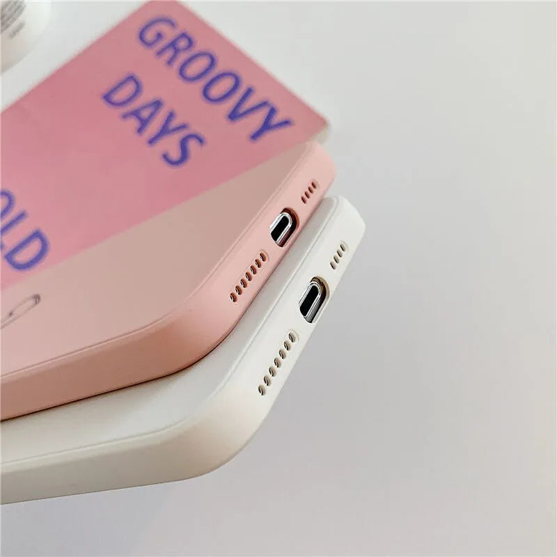 Solid colour TPU silicone phone case for Apple iPhone on a table