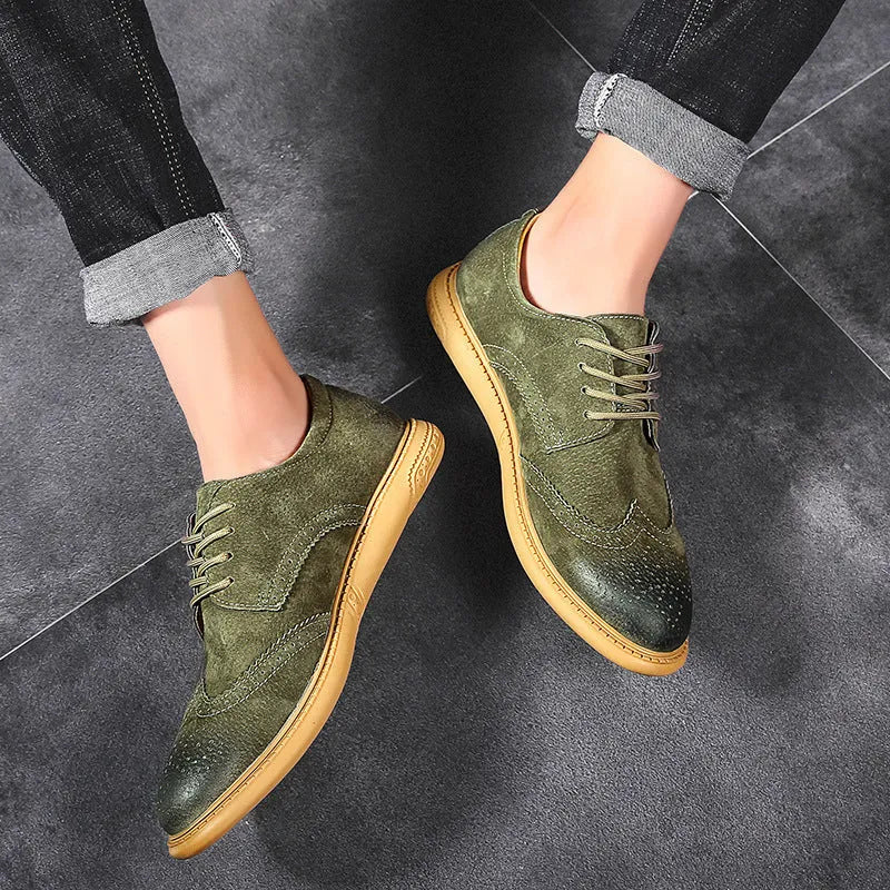 Men's black genuine cowhide business lace-up shoes with leather toe cap on a grey background.
