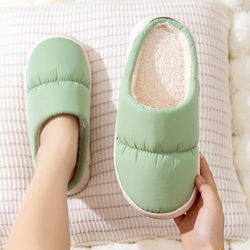 Down cotton indoor slippers with artificial leather upper and rubber sole in various colours