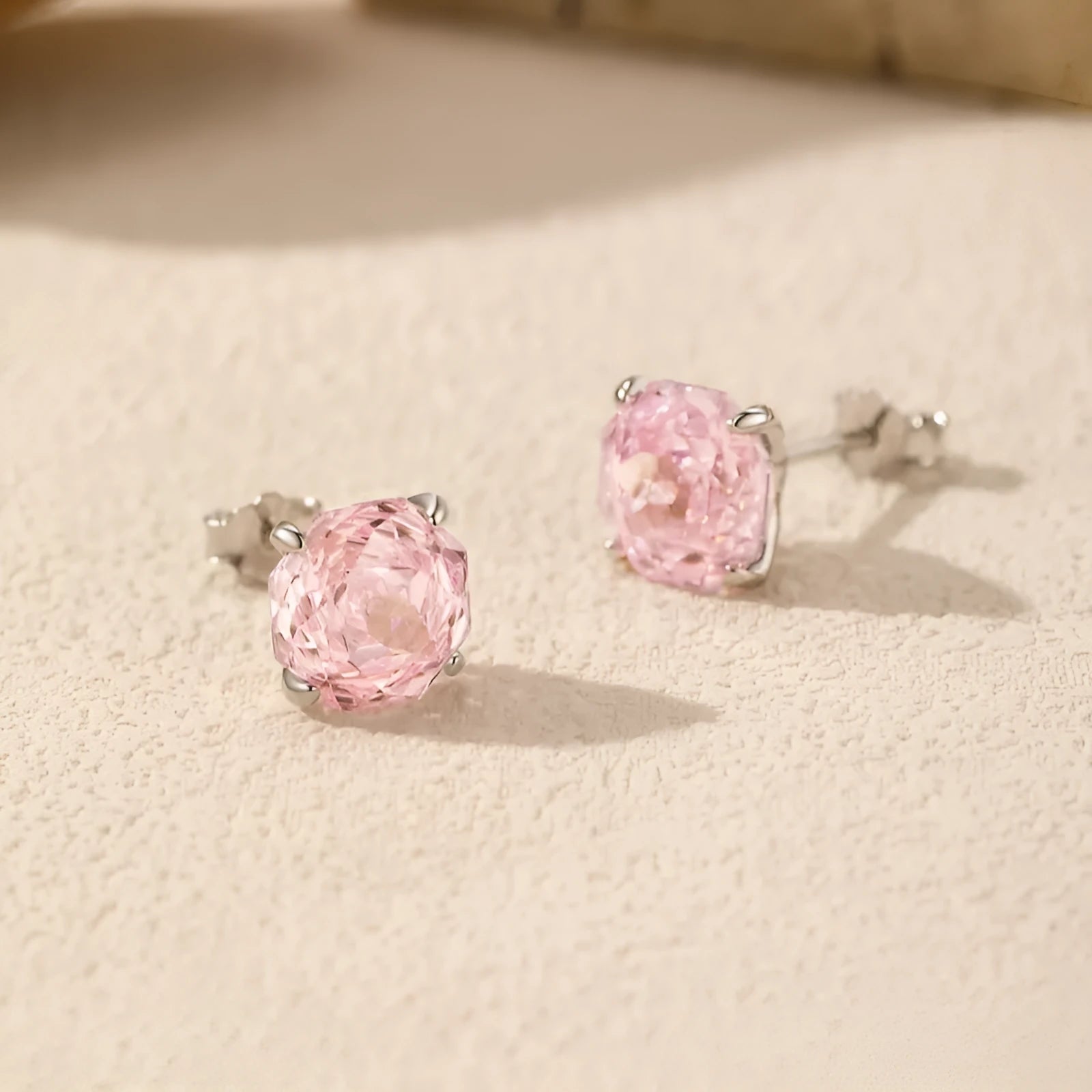 S925 sterling silver rose stud earrings in 6mm and 8mm sizes with floral design