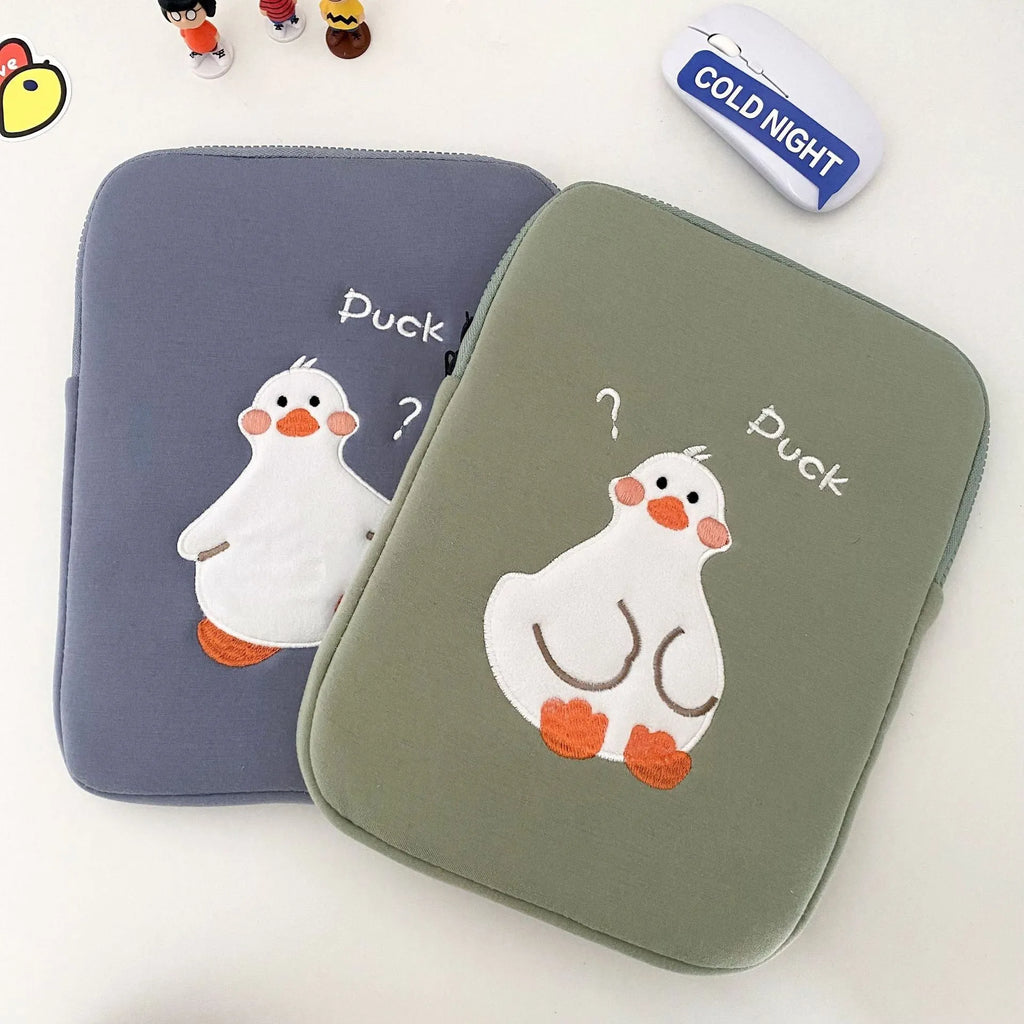 Blue cotton tablet case with embroidered cartoon duck design and zipper closure