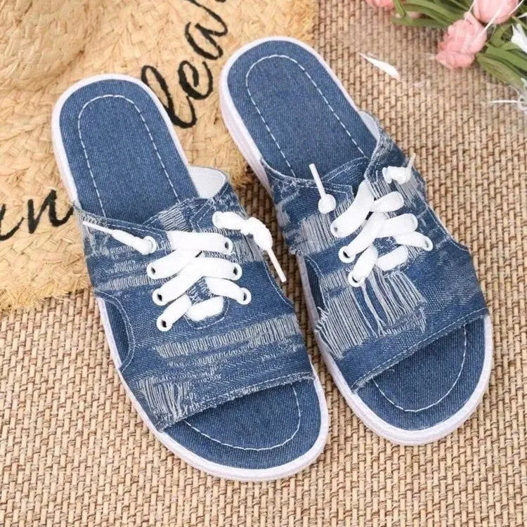 Blue Roman style women's canvas slippers with cloth lining and rubber soles