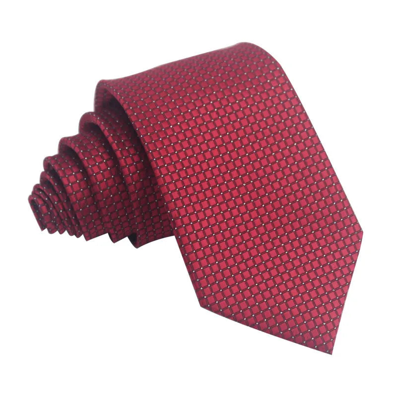 Close-up of a red, black, and blue striped men's formal tie with a textured Jacquard weave.
