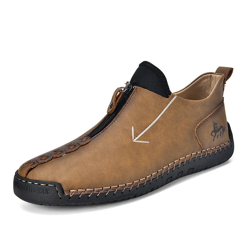 Men's brown leather-look zip-up martin boots with a round toe and rubber sole on a white background.