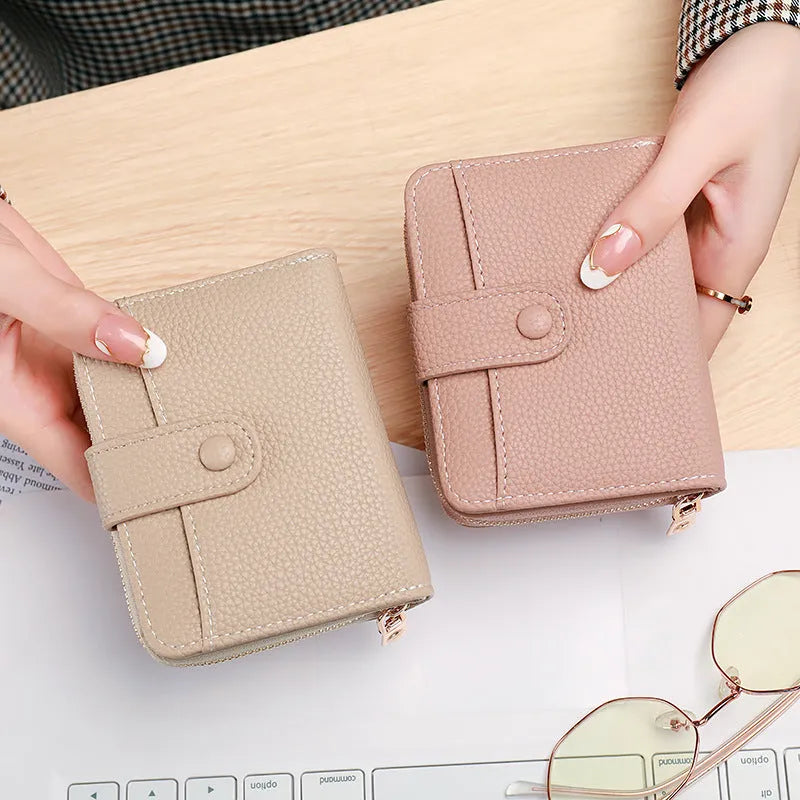 Ladies' short wallet with lychee pattern in 2-fold PU design showing colour options