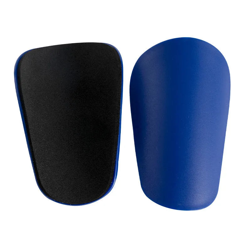 PU mini shin guards for football and sports protection in black, white, red and blue colours