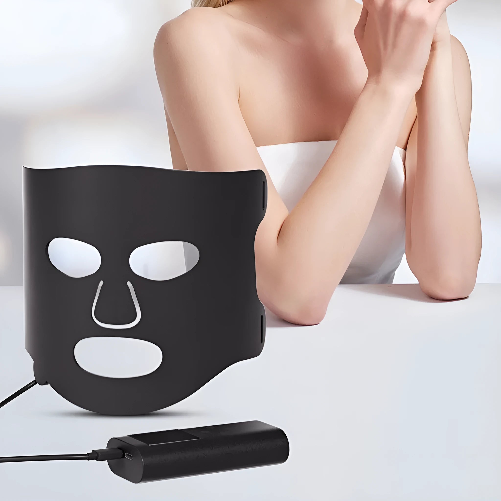 Black gold LED phototherapy face mask with seven light therapy modes for home skin treatment