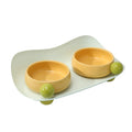 Ceramic elevated pet feeding bowl set with two bowls and non-slip base in pink colour