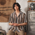 Grey plus-size Japanese-style Cuban collar short sleeve shirt with hollow jacquard texture.