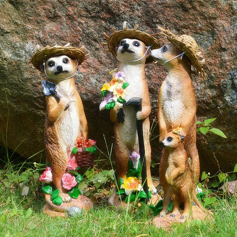 Straw hat mongoose ornament set with gardening tools in yellow brown and straw colour variations