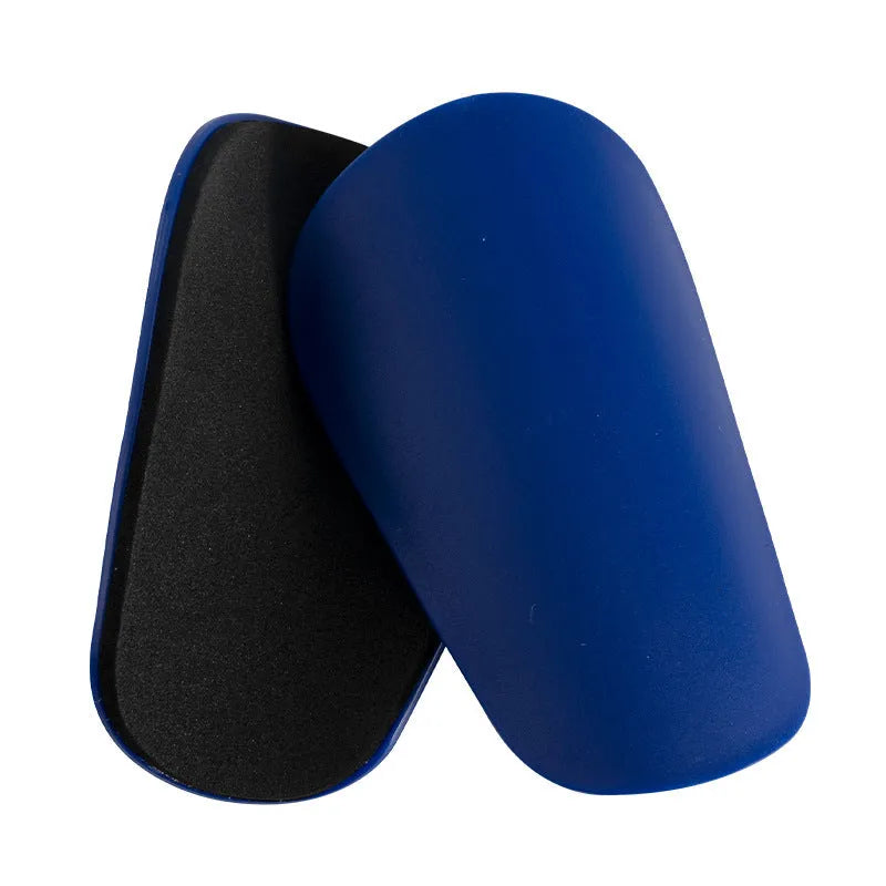 PU mini shin guards for football and sports protection in black, white, red and blue colours
