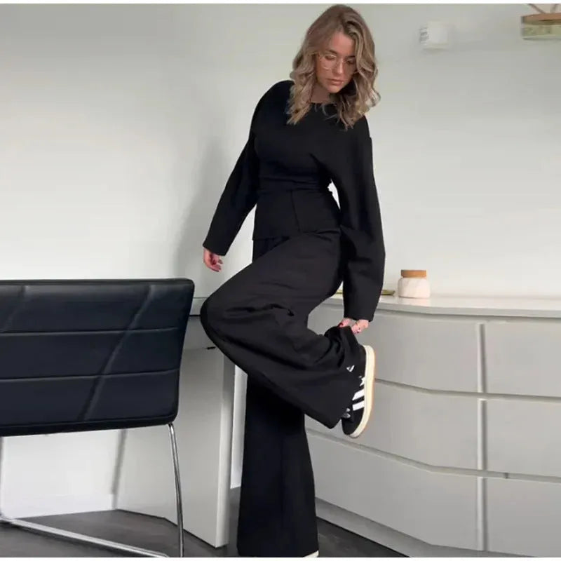 Women's black polar fleece suit set with O-neck top and wide leg trousers