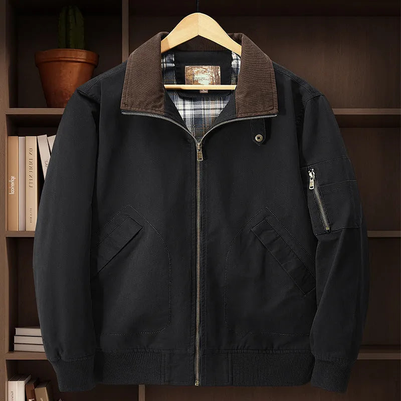 Men's plus-size washed cotton baseball flight jacket in army green, shown on a hanger.