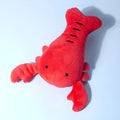 Red lobster stuffed dog toy with squeaker for small and medium breed interactive play