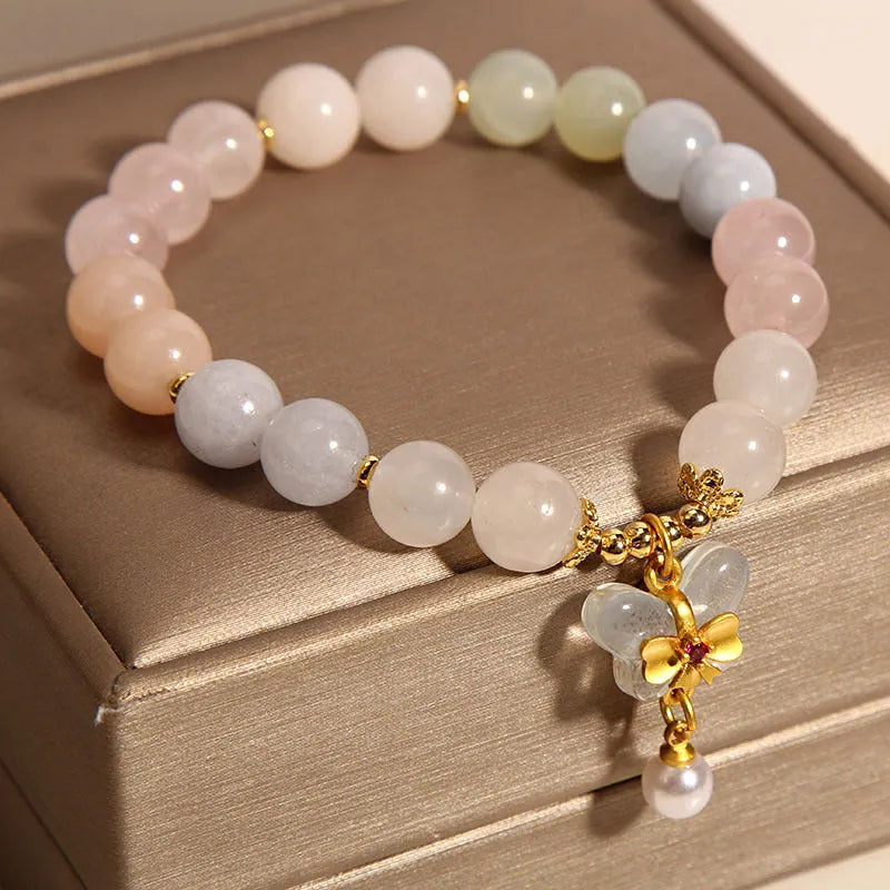 Morganite bracelet with colourful natural stone butterfly pendant on crystal bracelet
