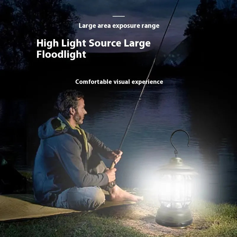 Dark green portable camping lantern with super bright LEDs, shown with a dry battery for scale.