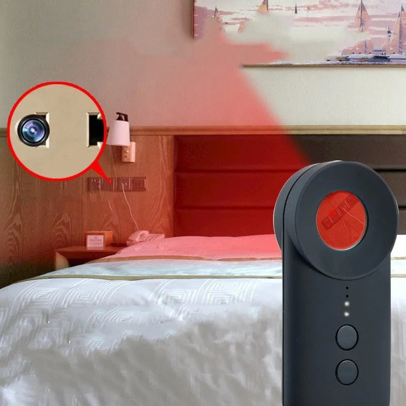 Black handheld GPS and camera detector with display, measuring 93.8mm long, shown with a USB charging cable.