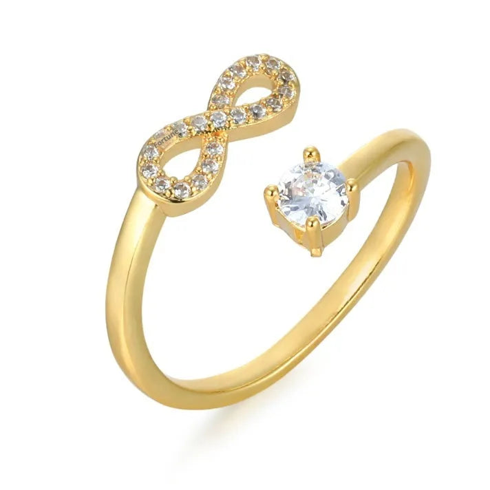 Geometric zircon letter ring showing character options with gold, rose gold and silver colour variations