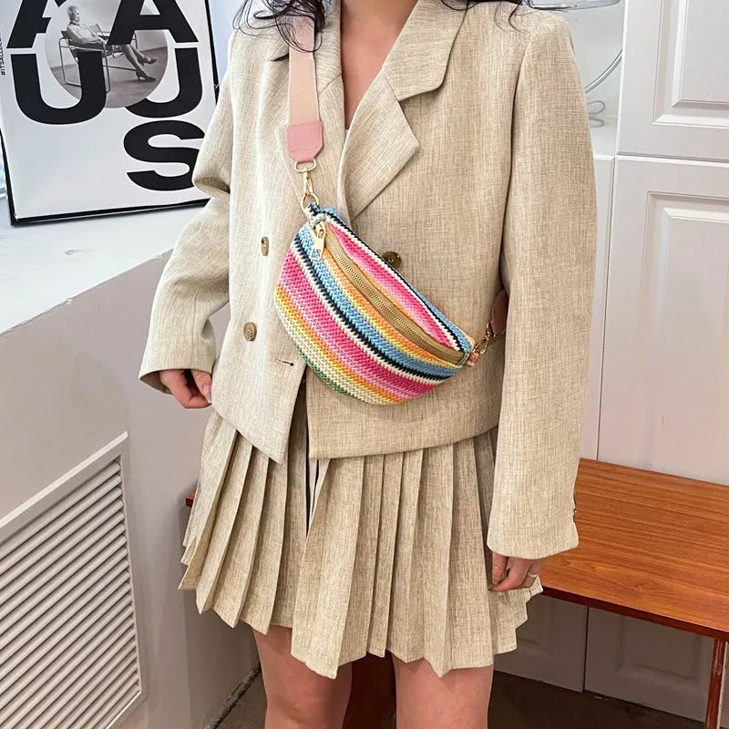 Bohemian style straw woven women's shoulder bag with adjustable strap in pink colour