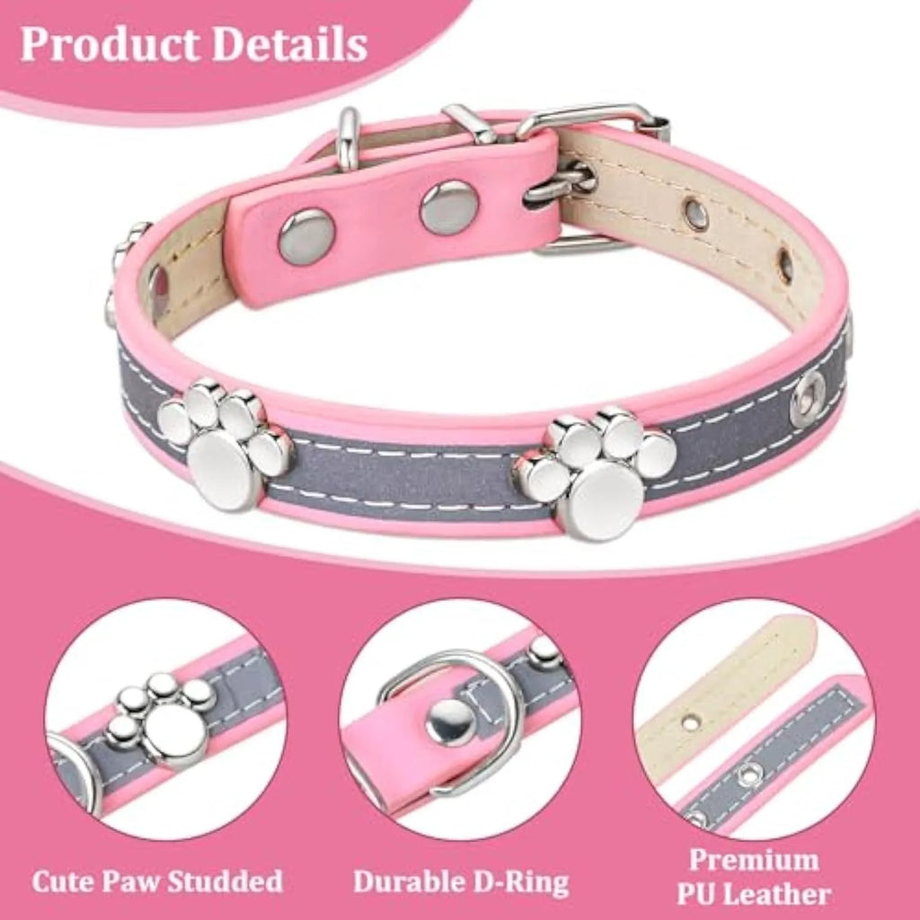 Reflective PU leather dog collar with metal paw rivets and an adjustable buckle on a grey background.