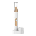 Gold-coloured ultrasonic tooth cleaner for removing tartar and surface stains on teeth.