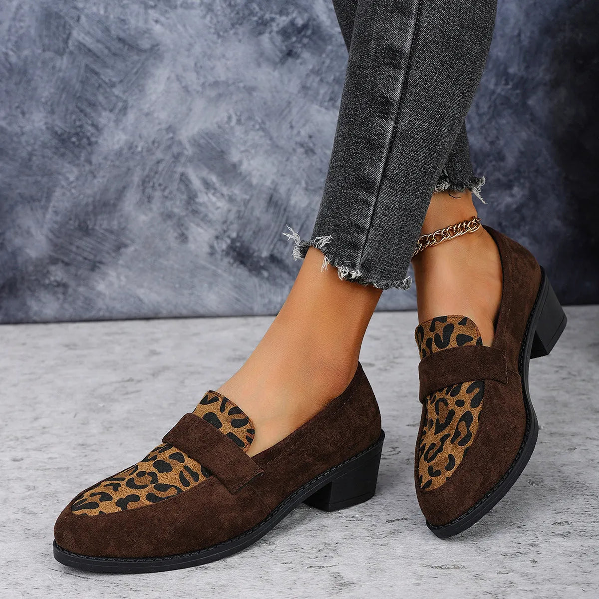 Leopard print suede slip-on shoes with a chunky mid heel and pointed toe in pink, brown, or khaki.